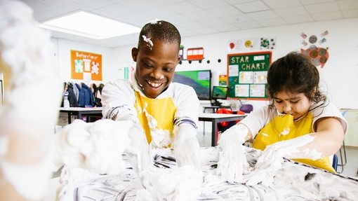 Pupils playing with foam in an art class 